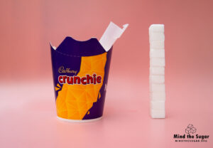 A photo of a McFlurry Crunchie  with 11.3 cubes of sugar.