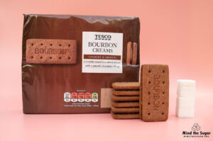 A photo of Tesco Bourbon Creams biscuits with 3.5 cubes of sugar.