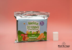 A photo of Heinz Apple Biscotti pack with 2.4 cubes of sugar.